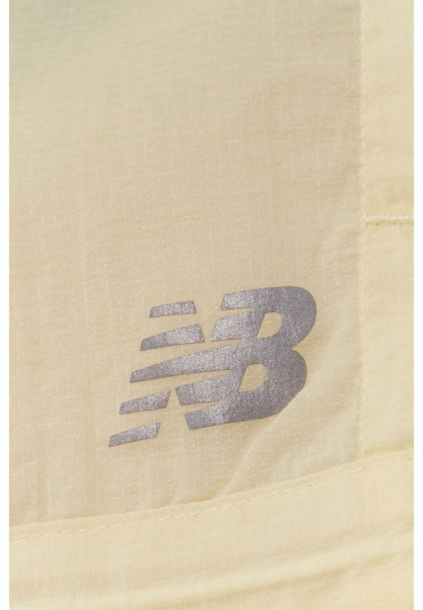 New Balance - Kurtka. Kolor: żółty. Materiał: tkanina. Wzór: gładki
