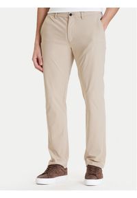 TOMMY HILFIGER - Tommy Hilfiger Chinosy Denton MW0MW43408 Beżowy Slim Fit. Kolor: beżowy. Materiał: syntetyk #1