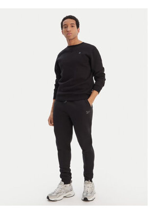 Reebok Spodnie dresowe Azaz RK25549CCM Czarny Slim Fit. Kolor: czarny. Materiał: syntetyk, bawełna