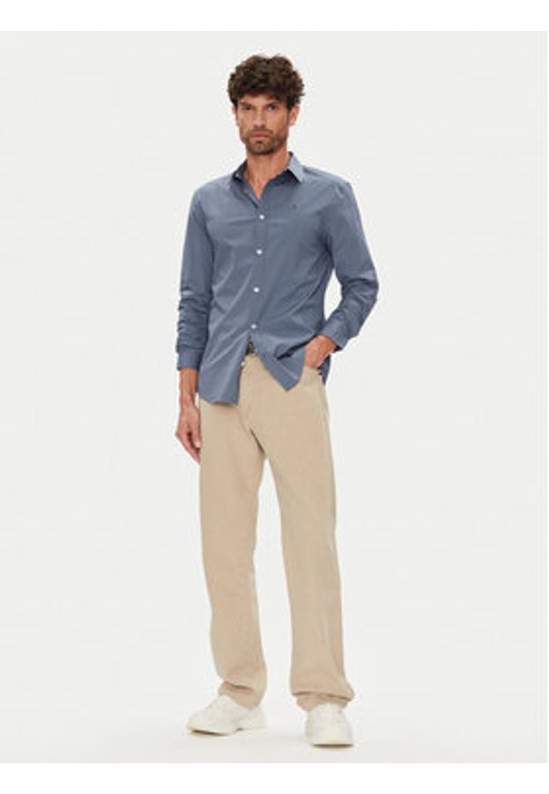 Tommy Jeans Koszula Original DM0DM04405 Niebieski Slim Fit. Kolor: niebieski. Materiał: bawełna