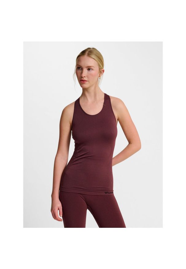 Damski bezszwowy tank top Hummel TIF. Kolor: wielokolorowy, czerwony, różowy, brązowy. Sport: piłka nożna