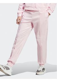 Adidas - adidas Spodnie dresowe Loose Trousers with Healing Crystals-Inspired Graphics IC0795 Różowy Loose Fit. Kolor: różowy. Materiał: bawełna