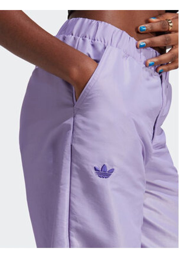 Adidas - adidas Spodnie dresowe Wide Leg Tracksuit Bottoms IC5443 Fioletowy. Kolor: fioletowy. Materiał: syntetyk