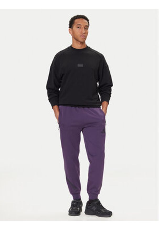 Adidas - adidas Spodnie dresowe Z.N.E. JW4726 Fioletowy Loose Fit. Kolor: fioletowy. Materiał: syntetyk