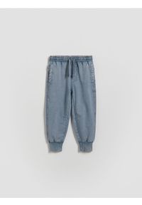 Reserved - Bawełniane joggery - granatowy. Kolor: niebieski. Materiał: bawełna #1