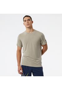 Koszulka męska New Balance MT23059AL - beżowa. Kolor: beżowy. Materiał: lyocell, poliester, materiał. Sport: fitness