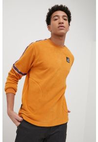 New Balance bluza MT13513MOE męska kolor pomarańczowy z aplikacją. Kolor: pomarańczowy. Materiał: dzianina. Wzór: aplikacja #3