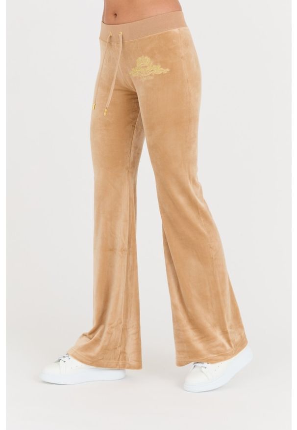 Juicy Couture - JUICY COUTURE Beżowe damskie spodnie Arched Metallic Layla, Rozmiar M. Kolor: beżowy