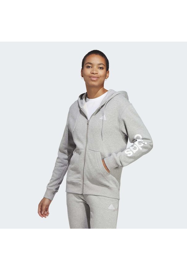 Adidas - Bluza damska adidas Essentials Linear Full-Zip French Terry Hoodie. Typ kołnierza: kaptur. Kolor: szary, biały, wielokolorowy. Materiał: dresówka. Sport: bieganie