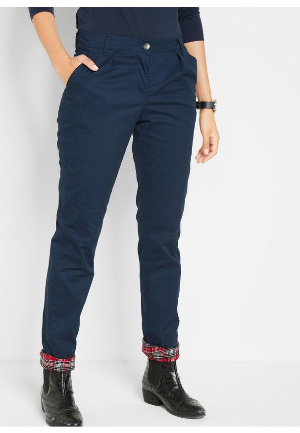 bonprix - Spodnie chino ocieplane. Kolor: niebieski