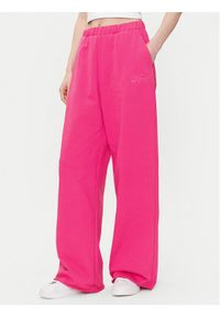 Hugo - HUGO Spodnie dresowe Nasuede_4 50541179 Różowy Relaxed Fit. Kolor: różowy. Materiał: bawełna