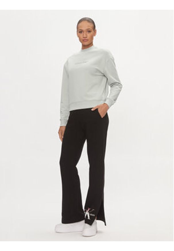 Calvin Klein Jeans Spodnie dresowe Diffused Monologo J20J223422 Czarny Regular Fit. Kolor: czarny. Materiał: bawełna
