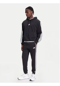 Adidas - adidas Spodnie dresowe Essential 3-Stripes JD1881 Czarny Regular Fit. Kolor: czarny. Materiał: bawełna, syntetyk #4