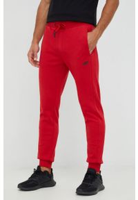 4f - 4F spodnie dresowe męskie kolor czerwony gładkie. Kolor: czerwony. Materiał: dresówka. Wzór: gładki #2