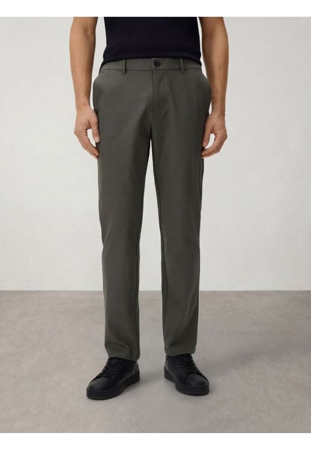 Reserved - Spodnie chino slim fit - jasny zielony. Kolor: zielony. Materiał: tkanina, wiskoza