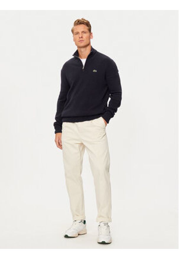 Lacoste Sweter AH3052 Granatowy Regular Fit. Kolor: niebieski. Materiał: wełna