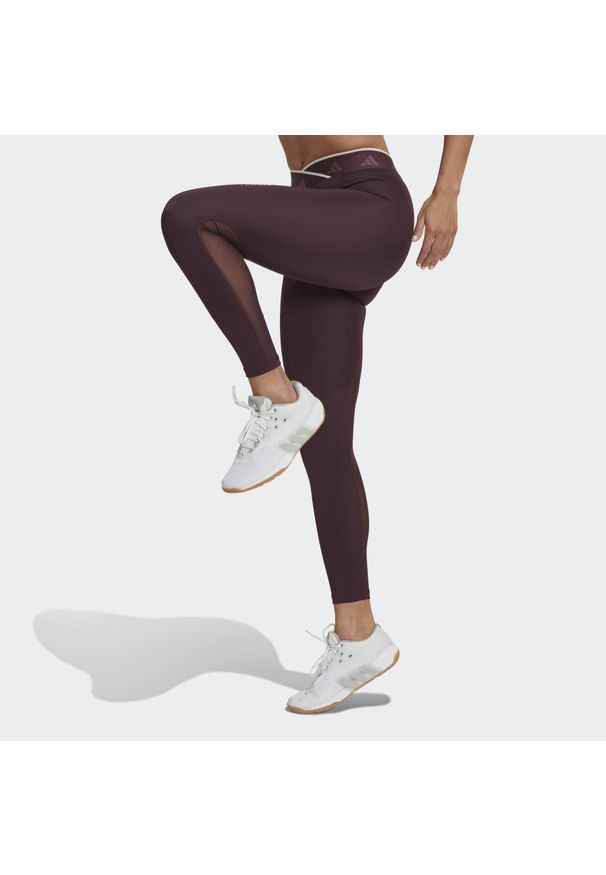 Adidas - Damskie elastyczne legginsy w kształcie litery V adidas Techfit. Kolor: czerwony. Technologia: Techfit (Adidas)