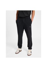 Spodnie do biegania Hummel Pulse. Kolor: czarny. Materiał: dresówka. Sport: fitness #1