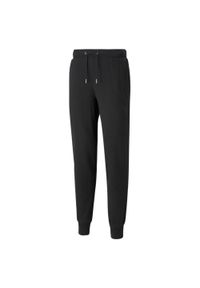 Puma Spodnie Jts 53229401. Kolor: czarny. Materiał: dresówka