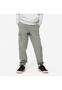 Decathlon - Spodnie dresowe dziecięce Domyos cargo. Kolor: zielony. Materiał: materiał, poliester, elastan