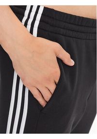 Adidas - adidas Spodnie dresowe IB3999 Czarny Slim Fit. Kolor: czarny. Materiał: bawełna #4