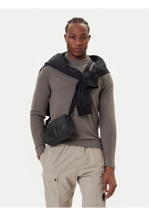 Calvin Klein Saszetka Puffer Camera Bag LV04D3192G Czarny. Kolor: czarny. Materiał: materiał