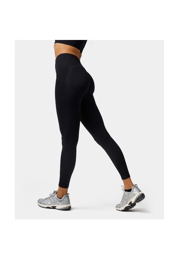 Legginsy bezszwowe push-up Carpatree Elite czarne. Stan: podwyższony. Kolor: czarny. Materiał: skóra, elastan