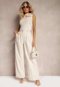 Renee - Jasnobeżowe Szerokie Spodnie High Waist Seraphella. Stan: podwyższony. Kolor: beżowy