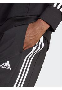 Adidas - adidas Spodnie dresowe AEROREADY Essentials Tapered Cuff Woven 3-Stripes Joggers IC0041 Czarny Regular Fit. Kolor: czarny. Materiał: syntetyk #4