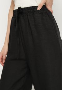 Born2be - Czarne Spodnie z Gumką w Talii z Prostymi Nogawkami Rannia. Okazja: na co dzień. Kolor: czarny. Styl: casual #5