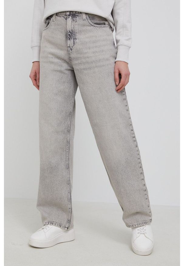 Calvin Klein Jeans Jeansy damskie high waist. Stan: podwyższony. Kolor: beżowy