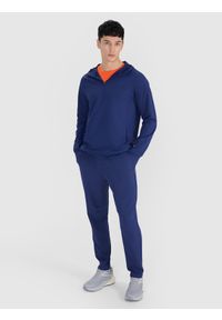 4f - 4F Spodnie treningowe szybkoschnące męskie 4F x Robert Lewandowski - granatowe XXL. Kolor: niebieski. Materiał: włókno, materiał, tkanina, syntetyk. Sport: fitness