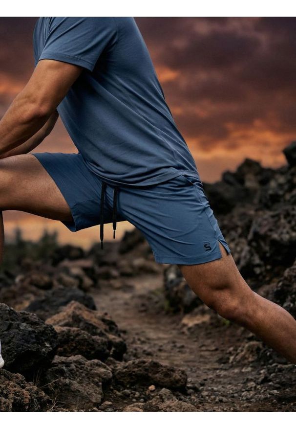 Sinsay - Szorty sportowe - niebieski. Kolor: niebieski. Styl: sportowy