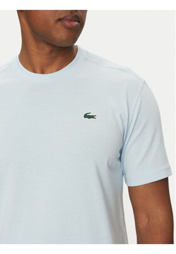 Lacoste T-Shirt TH7618 Błękitny Regular Fit. Kolor: niebieski. Materiał: syntetyk, bawełna