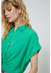 medicine - Medicine bluzka damska kolor zielony gładka. Okazja: na co dzień. Kolor: zielony. Długość rękawa: krótki rękaw. Długość: krótkie. Wzór: gładki. Styl: casual