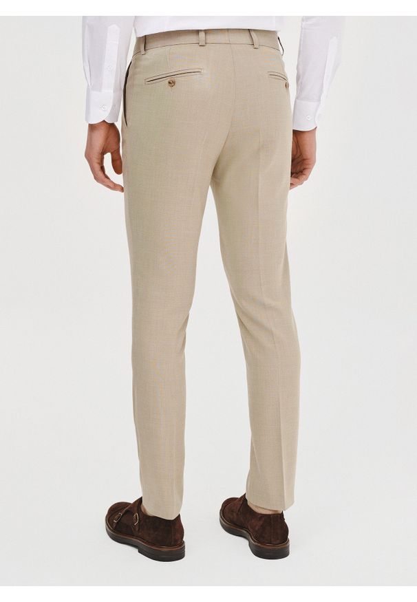 Pako Lorente - PAKO LORENTE – Beżowe spodnie ganiturowe. Kolor: beżowy. Materiał: poliester, wiskoza, elastan. Wzór: gładki. Styl: młodzieżowy, elegancki