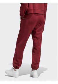 Adidas - adidas Spodnie dresowe Joggers IC6035 Czerwony Slim Fit. Kolor: czerwony. Materiał: bawełna