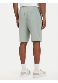 TOMMY HILFIGER - Tommy Hilfiger Szorty sportowe Essential UM0UM03914 Zielony jasny Regular Fit. Kolor: zielony. Materiał: bawełna. Styl: sportowy #3