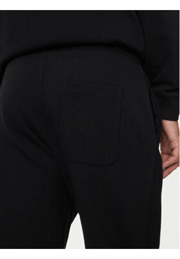 United Colors of Benetton - United Colors Of Benetton Spodnie dresowe 342ZUF01B Czarny Regular Fit. Kolor: czarny. Materiał: bawełna