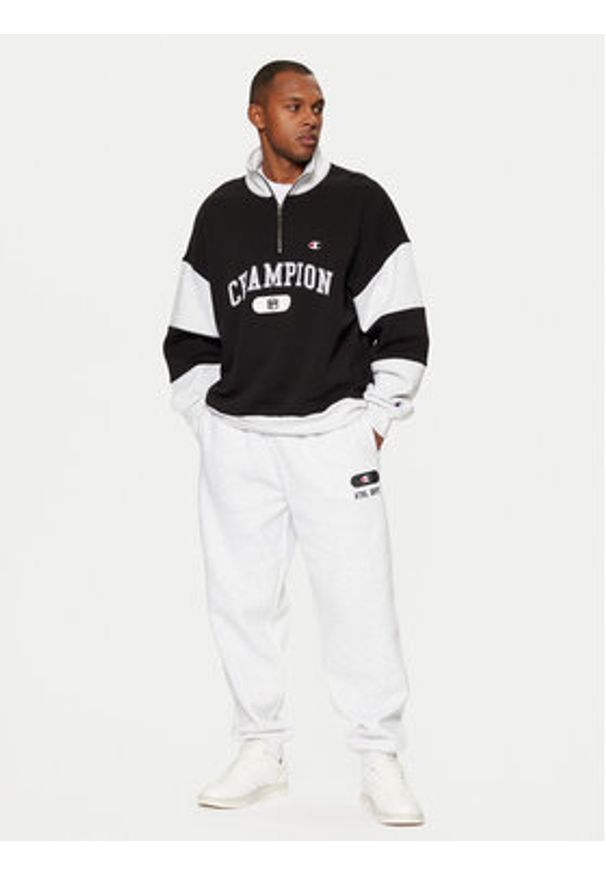 Champion Spodnie dresowe 220434 Szary Loose Fit. Kolor: szary. Materiał: bawełna