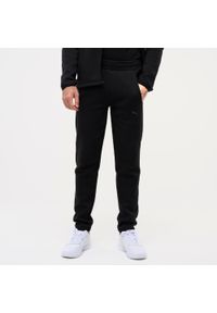 Spodnie dresowe męskie Puma Active Gym & Pilates. Kolor: czarny. Materiał: dresówka. Sport: joga i pilates #1