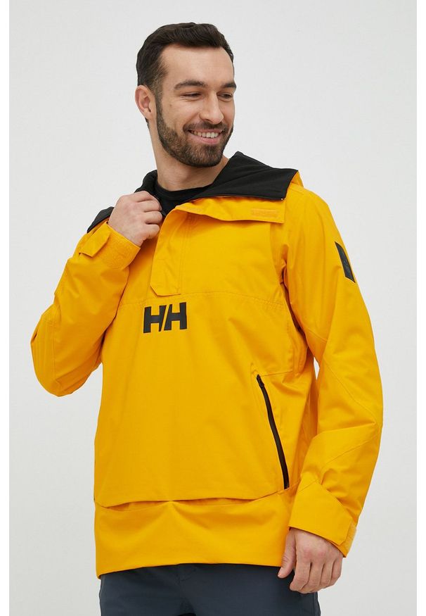 Helly Hansen kurtka narciarska Ullr. Kolor: żółty. Materiał: włókno, puch, materiał. Technologia: Primaloft. Długość: krótkie. Sezon: zima. Sport: narciarstwo