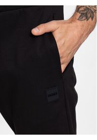 BOSS - Boss Spodnie dresowe 50485181 Czarny Regular Fit. Kolor: czarny. Materiał: bawełna #4