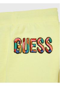 Guess Spodnie dresowe N3GQ11 KA6R0 Żółty Relaxed Fit. Kolor: żółty. Materiał: bawełna #3