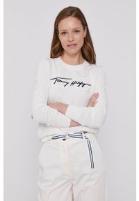 TOMMY HILFIGER - Tommy Hilfiger - Sweter. Okazja: na co dzień. Kolor: beżowy. Długość rękawa: długi rękaw. Długość: długie. Wzór: aplikacja. Styl: casual #1