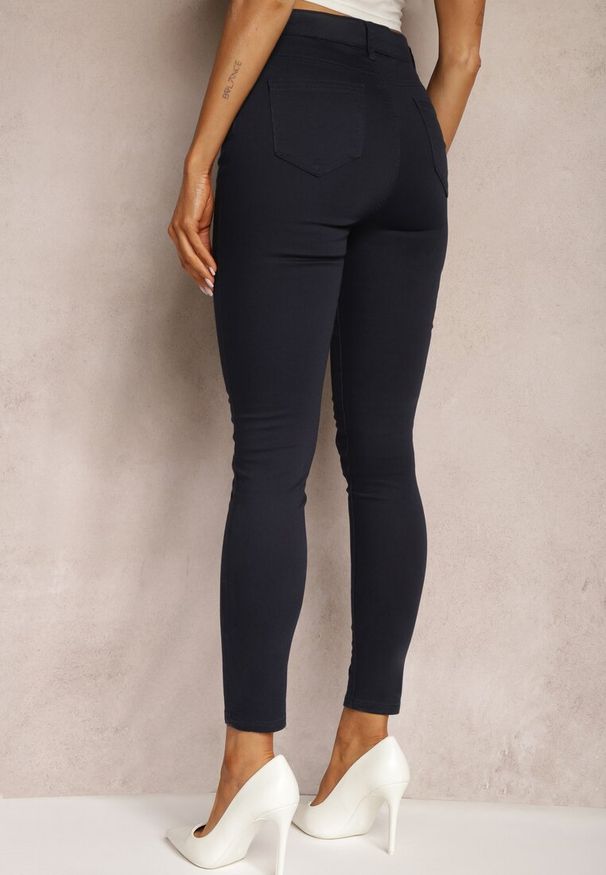 Renee - Granatowe Spodnie Skinny Winvienne. Stan: podwyższony. Kolor: niebieski. Długość: długie. Wzór: ażurowy