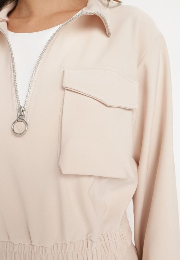 Born2be - Beżowy Komplet Dresowy z Bluzą o Krótkim Fasonie i Spodniami Typu Jogger z Kieszeniami Riavirae. Kolor: beżowy. Materiał: dresówka