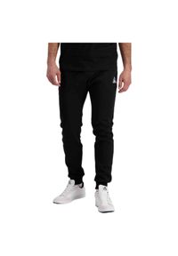 Wąskie spodnie do biegania Le Coq Sportif Pantalon de jogging ample Le Coq Sport. Kolor: czarny. Sport: bieganie #1