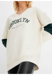 bonprix - Bluza o fasonie oversize. Kolor: beżowy. Wzór: nadruk