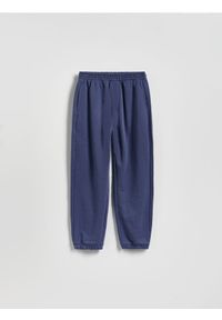Reserved - Bawełniane spodnie jogger - granatowy. Kolor: niebieski. Materiał: bawełna